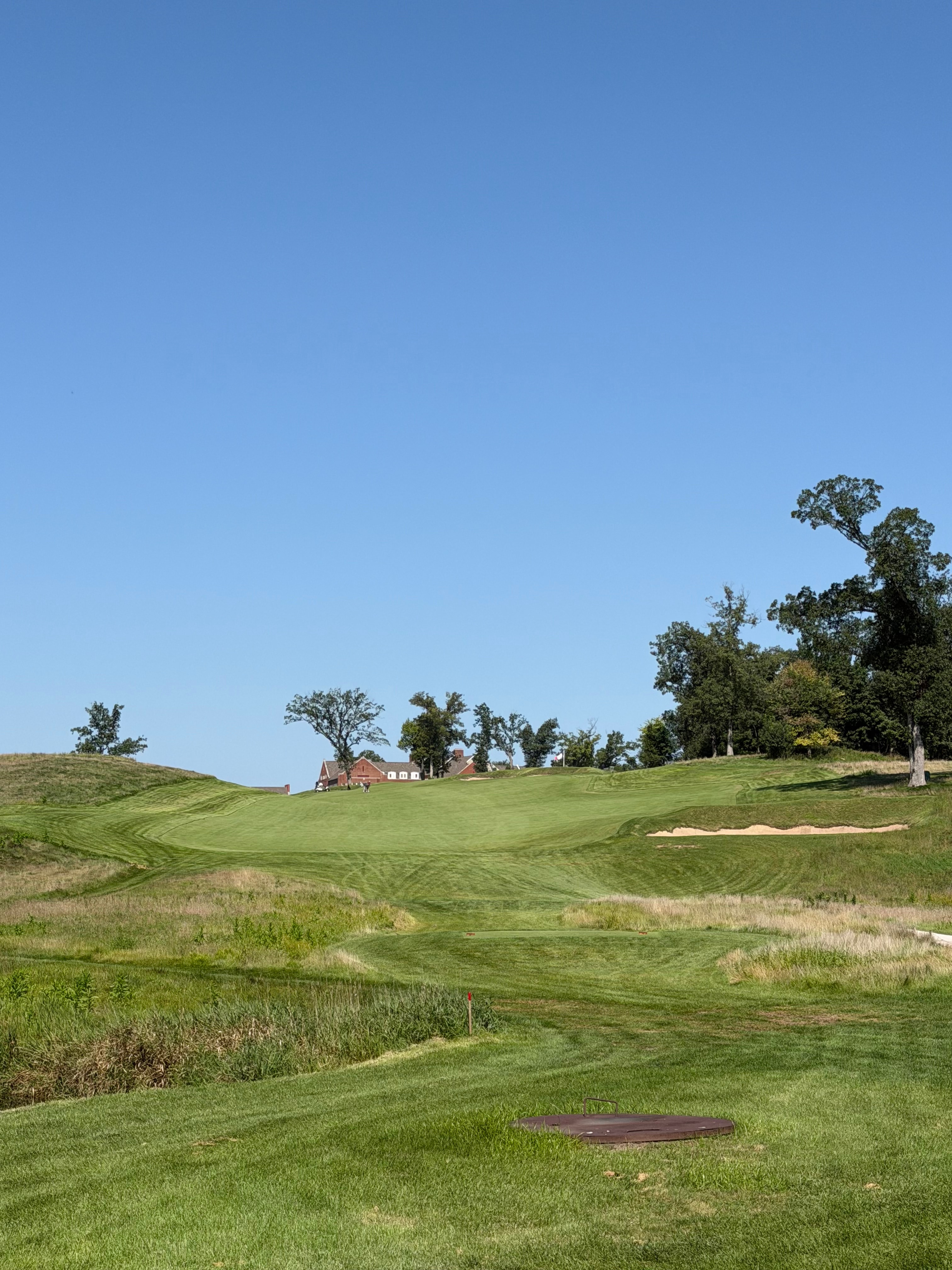 The blind uphill ninth hole at Cedar Rapids Country Club